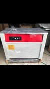 Box Strapping Machine