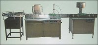 Automatic Four Head Liquid Vial Filling And Rubber Stoppering Machine