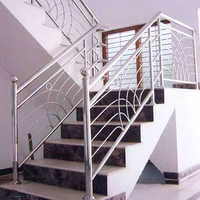 Spring flower design wrought iron stair rail - Modern - Orlando - by DeLand  Metal Craft Co | Houzz NZ