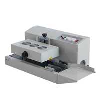 Induction sealing machine