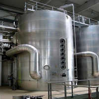 Continuous vacuum pan