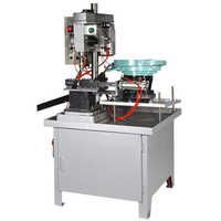 Coil tapping machine