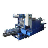 Automatic shrink wrapping machines