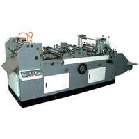 Photo album making machine