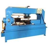 Tube reducing machine