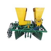 Plastic mulch laying machine